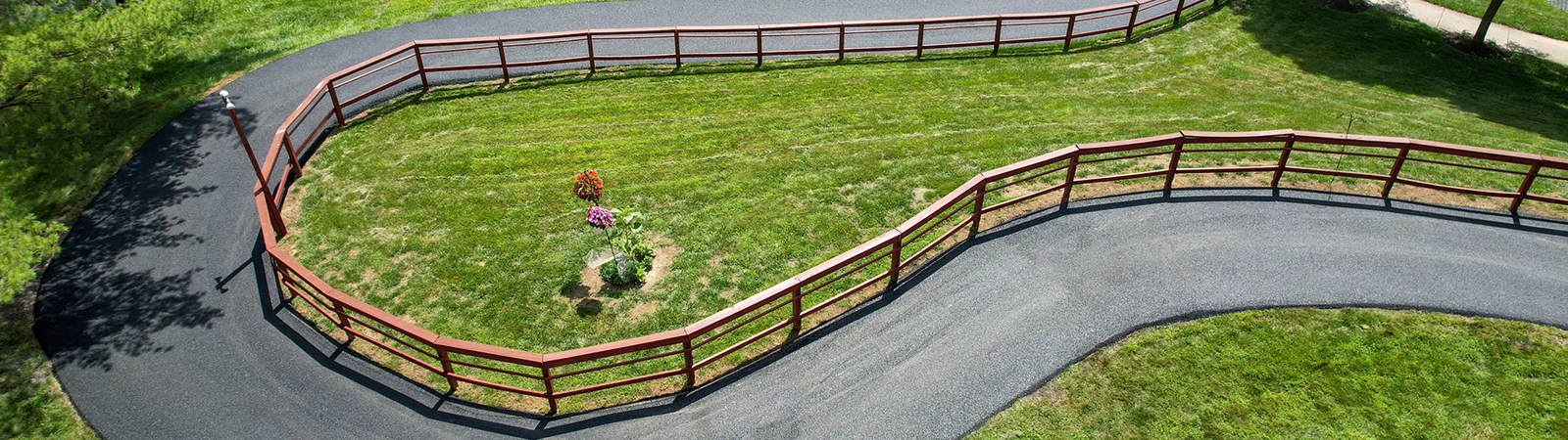 Image of paved trail around a field