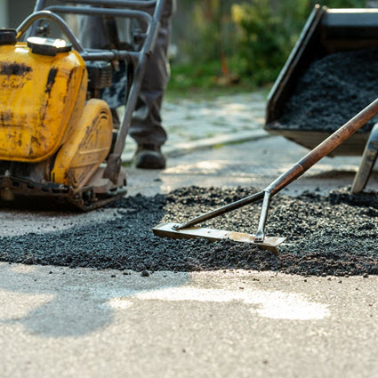 Image f asphalt roller at work. 